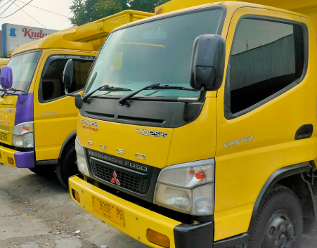 Manajemen Logistik Surabaya: Strategi Distribusi Cerdas Menggunakan Layanan Sewa Truk